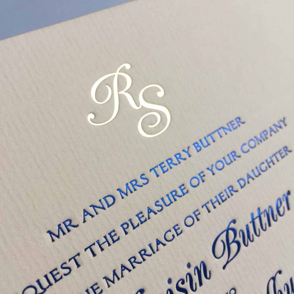 gold foil and blue wedding invitations