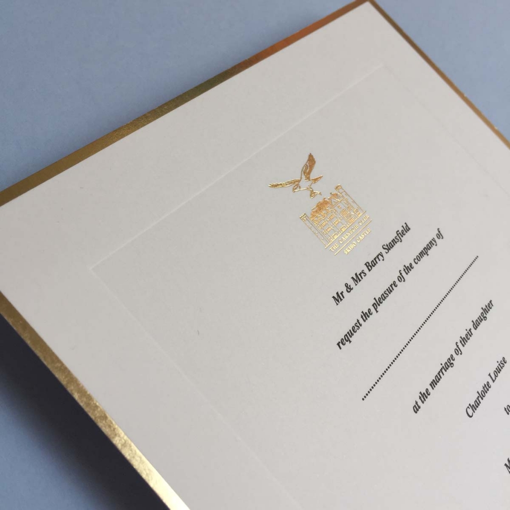 gold border motif wedding invitation