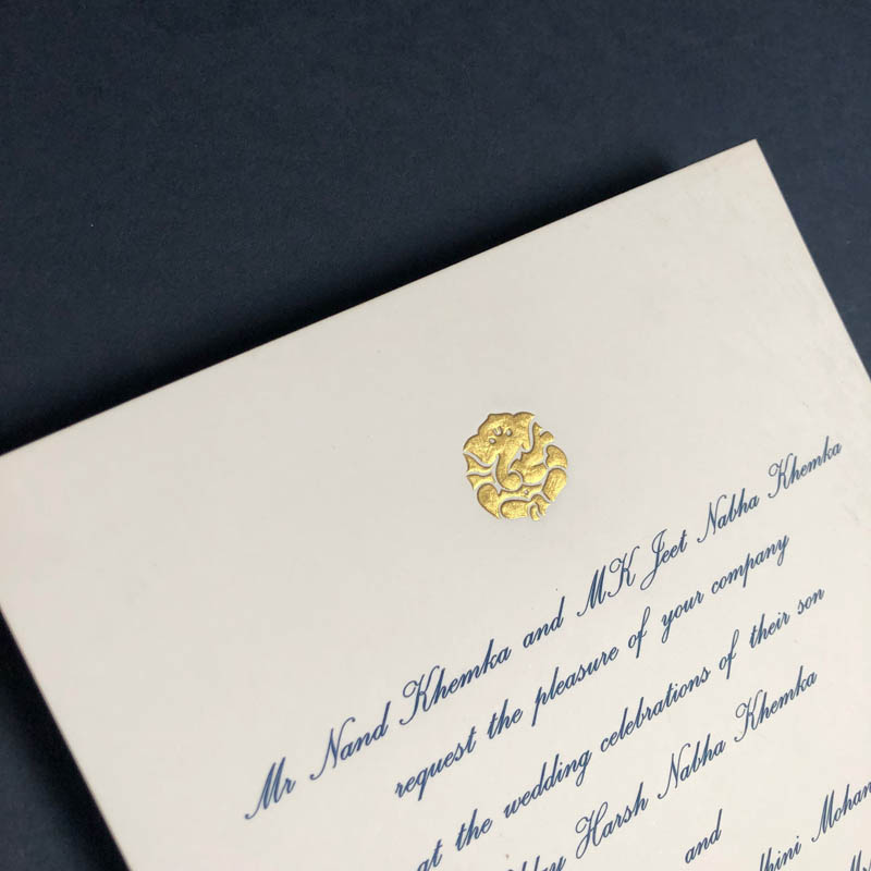 Gold elephant head motif wedding invitation