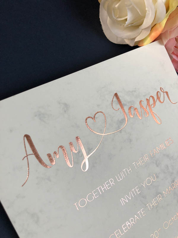 Marble and rose gold foiled wedding invitation