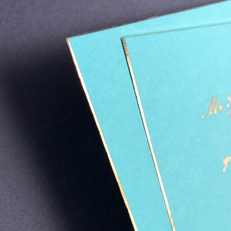 Turquoise and gold edged wedding invitation